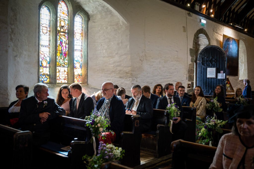 congregation at a church wedding in cornwall