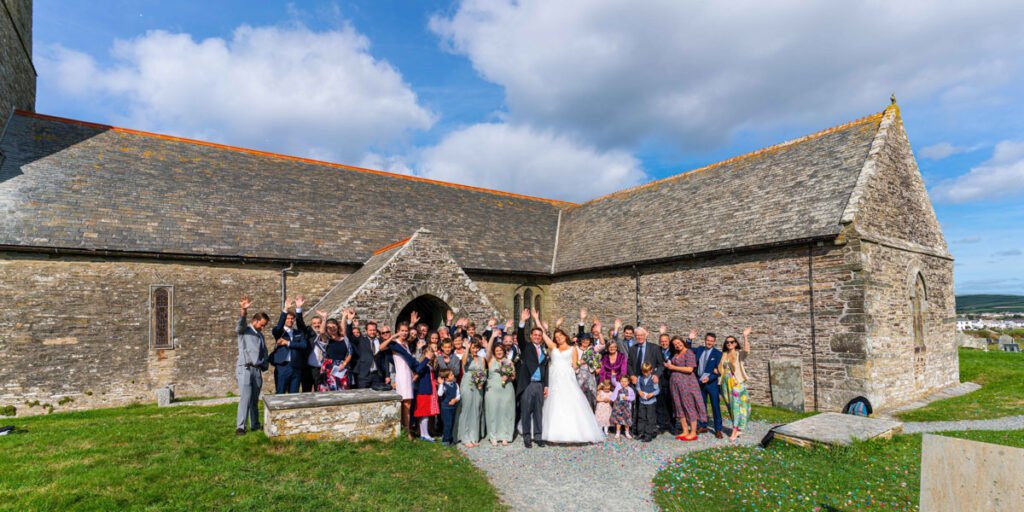 wedding group shot at the church in tintagel