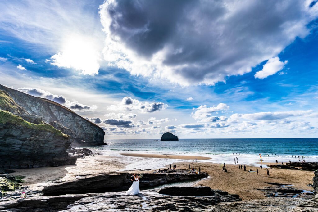 bride and groom at Trebarwith strand beach in cornwall