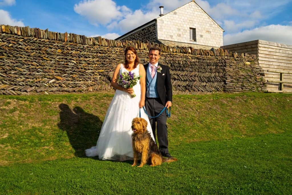 bride and groom with dog