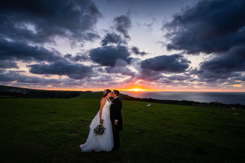 bride and groom sunset wedding image by the sea