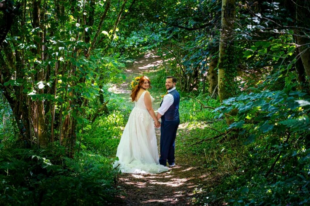 Bride and groom portrait in the woods