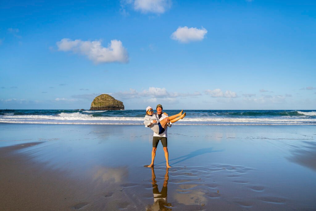 Bride and groom on the beach trebarwith cornwall