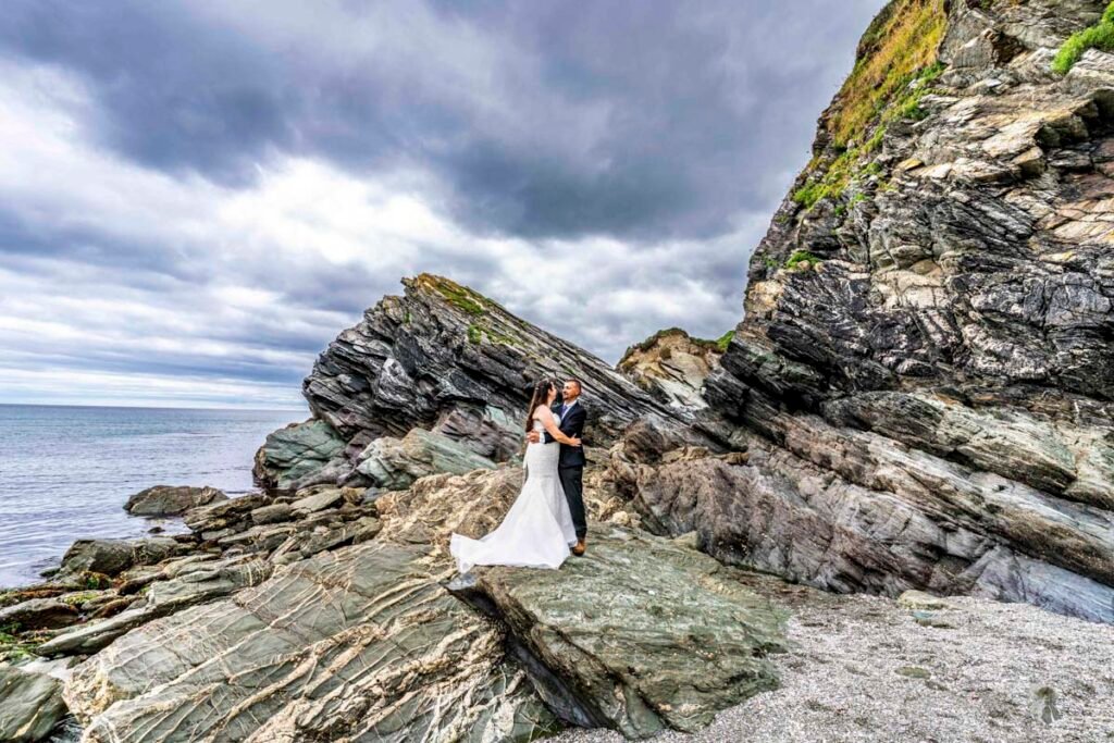 Bride and groom shot on the cliffs in Cornwall