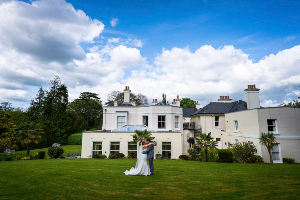 bride and groom portrait at St Elizabeths house plynpton