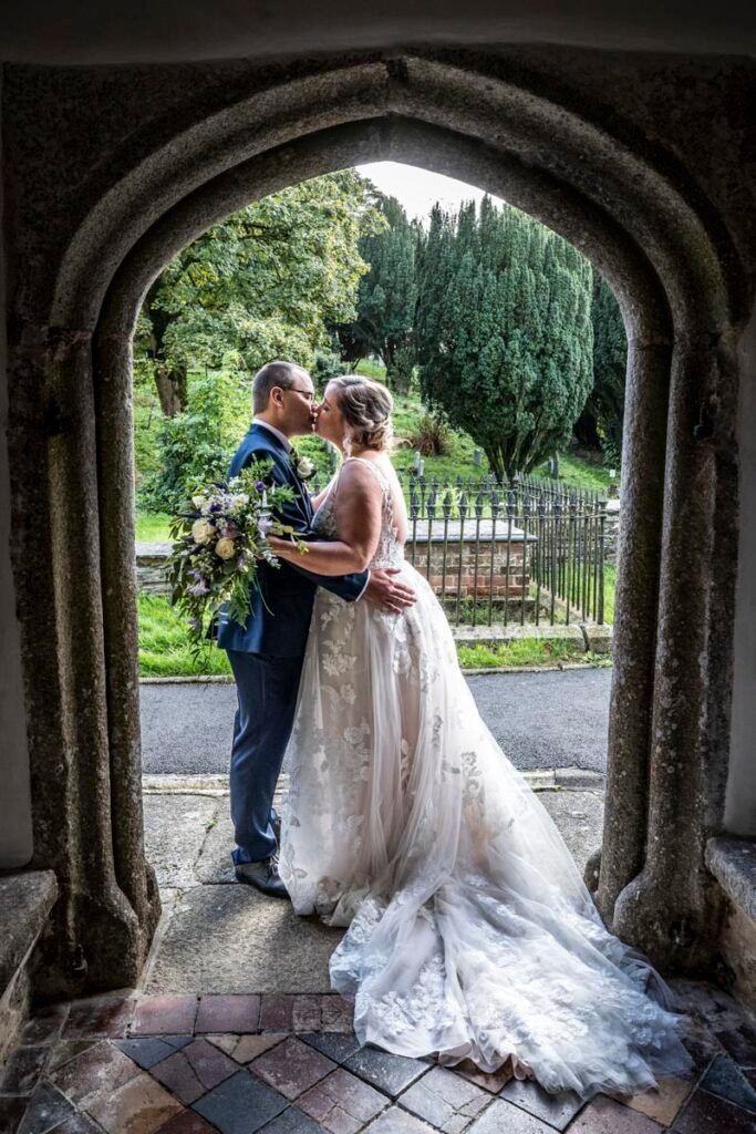 Bride and Groom church doorway portrait