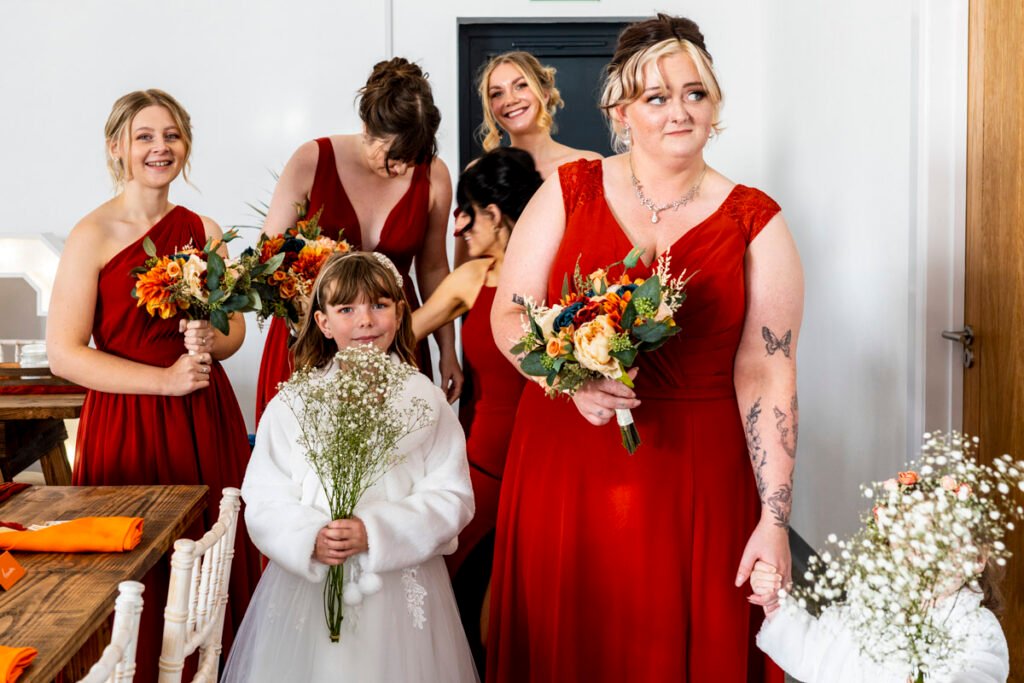 Bridesmaids arriving for the ceremony at The barn at Pengelly Cornwall