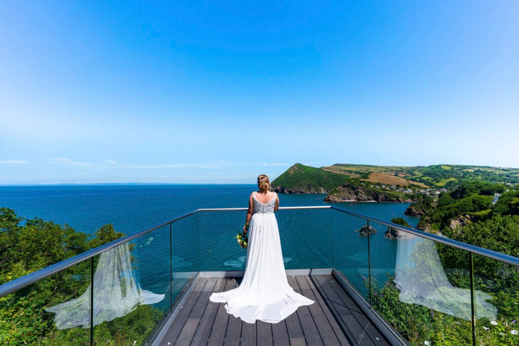 Bride portrait overlooking the sea at the Sandy Cove Hotel Devon