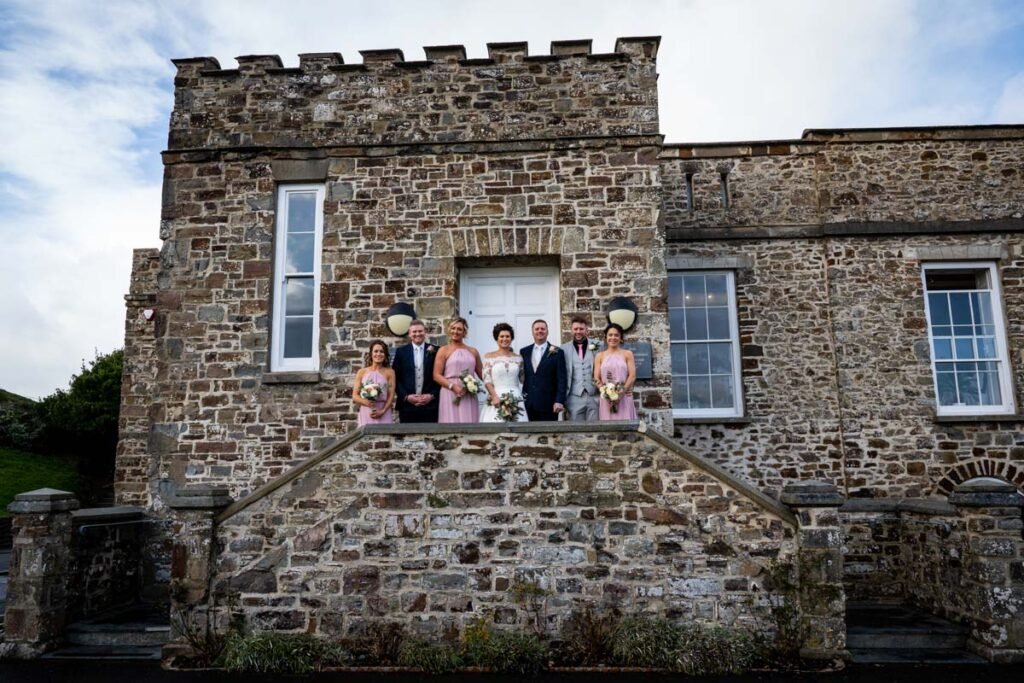 wedding group shot bude castle cornwall