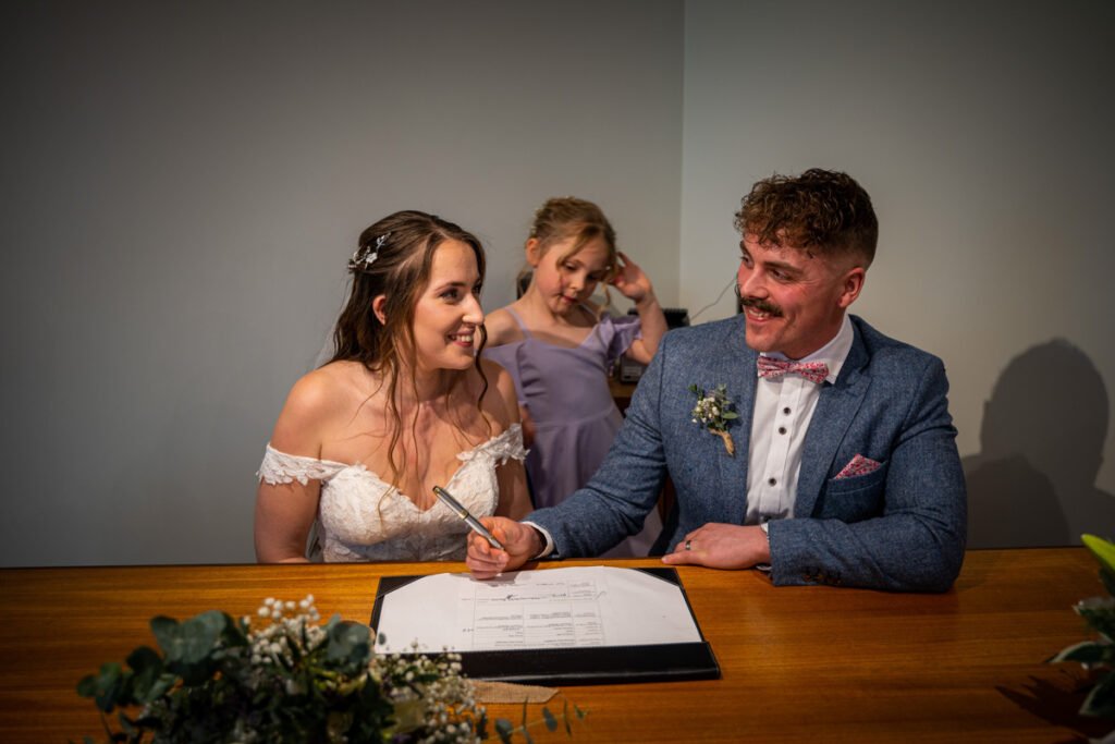 signing the register wedding photograph cornwall