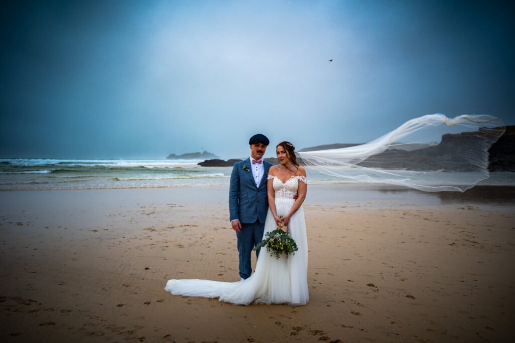 Bride and groom at Godrevy beach cornwall