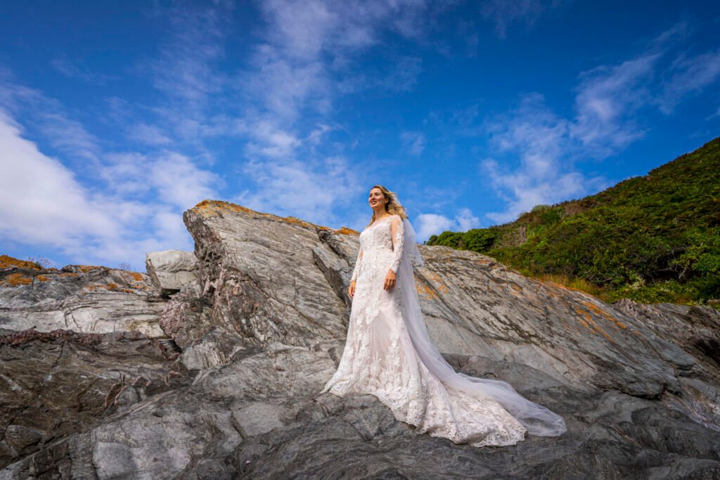 bride on the beach at Polhawn fort cornwall