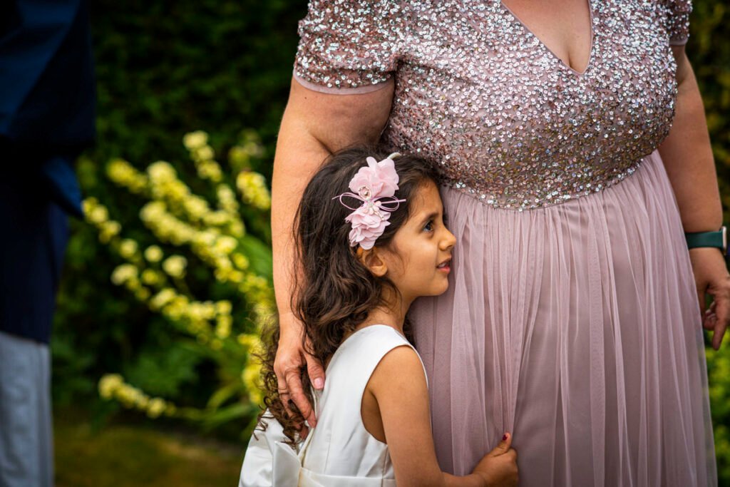 flower girl and bridesmaid outdoor shot
