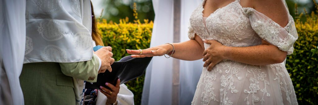 wedding rings excjange outdoor wedding ceremony