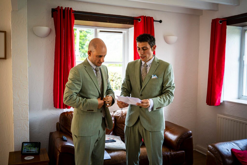 groom and best man reading his speech