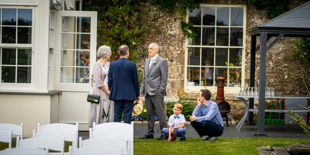 wedding guests casual image in the garden