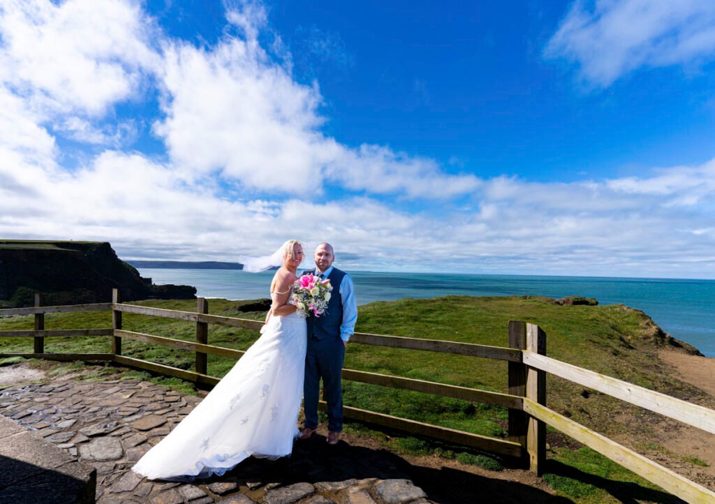 Bride and groom coastal view bude cornwall