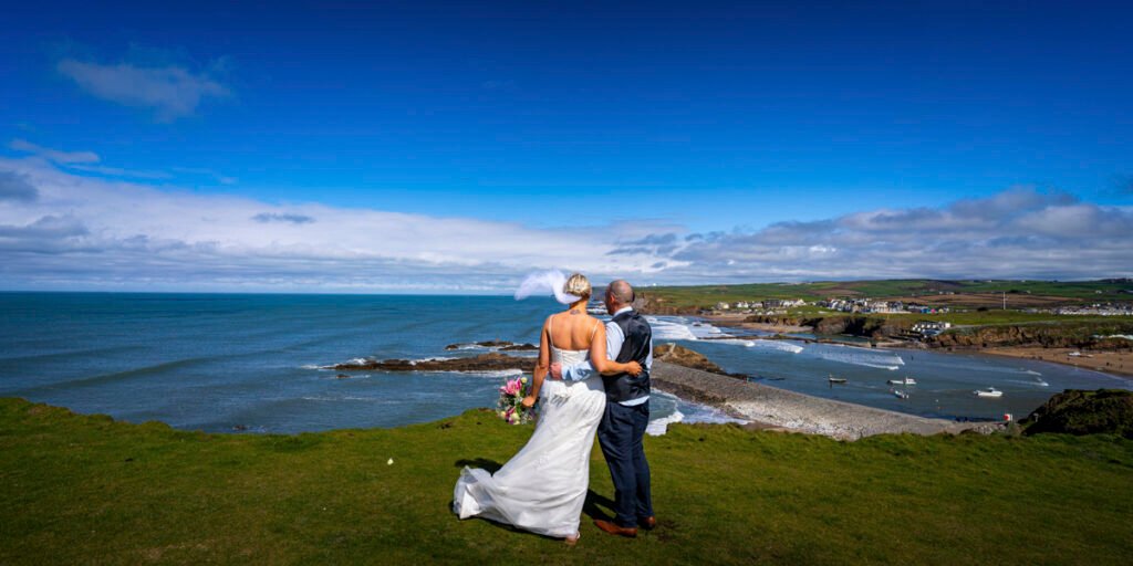 Bride and Groom on the cliffs at bude cornwall