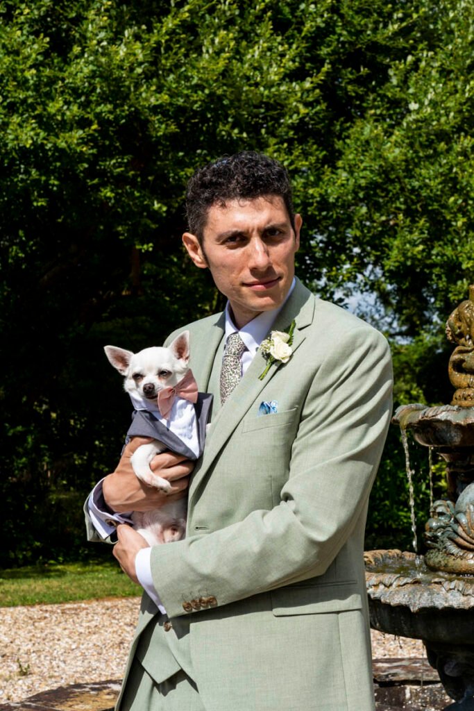 groom portrait with dog