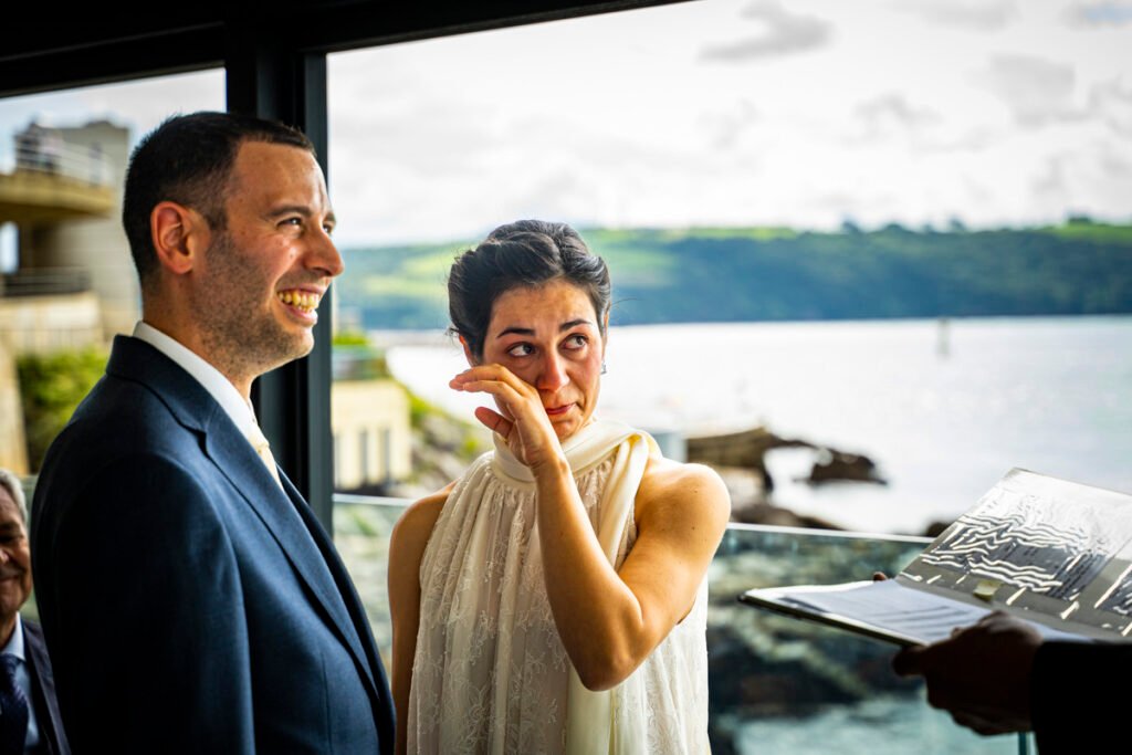 bride and groom exchanging vows during the wedding ceremony