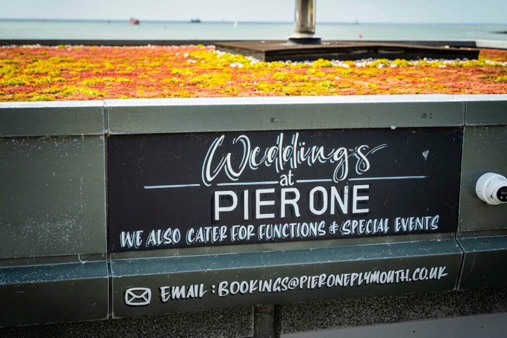 sign for Pier one weddings