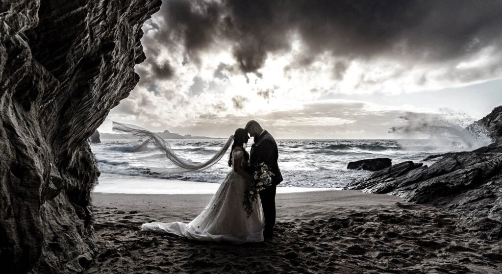 Bride and Groom at sunset on the beach in Cornwall Black and White