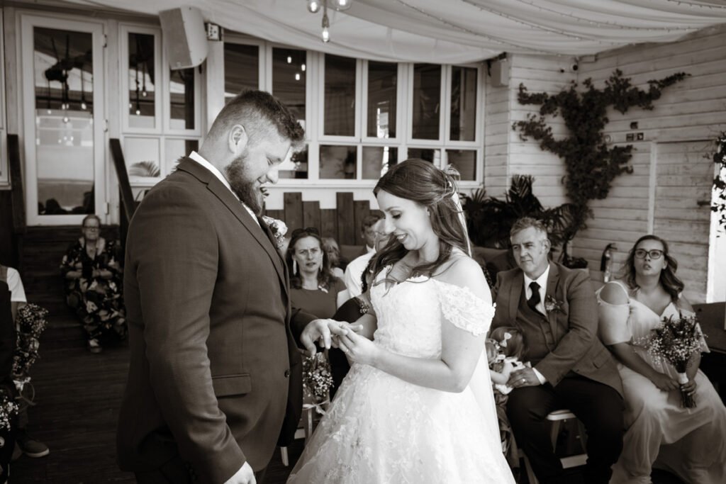 bride and groom exchange rings