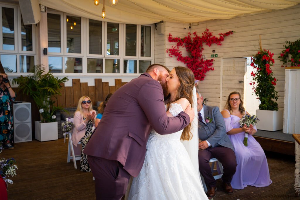 bride and groom 1st kiss