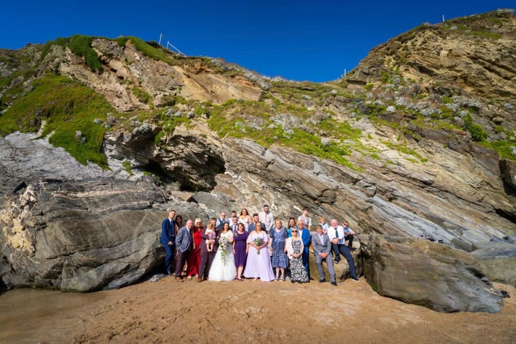 wedding group shot cliffs background