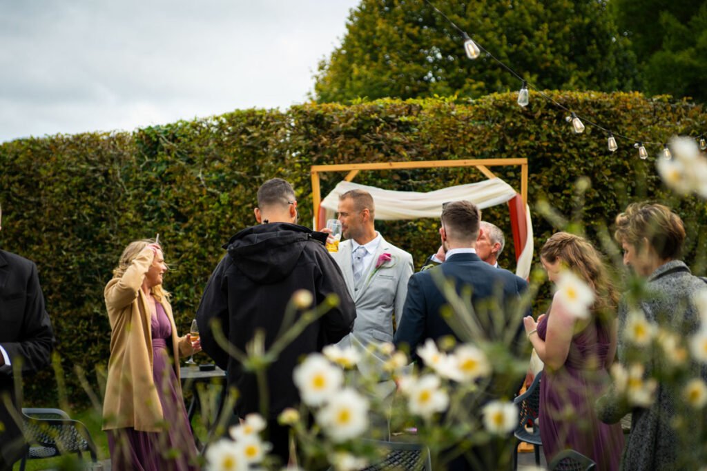 wedding guests in the garden