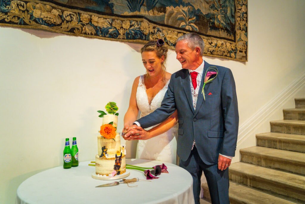 Bride and Groom cutting the wedding cake