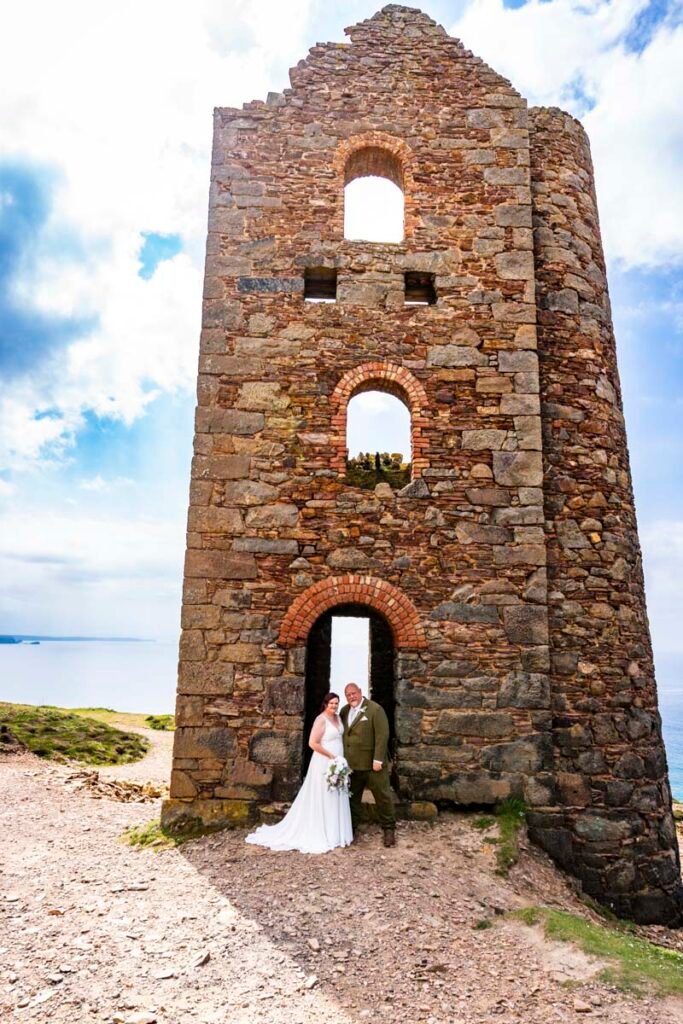 Bride and Groom in front of Wheal Coates mine engine house cornwall