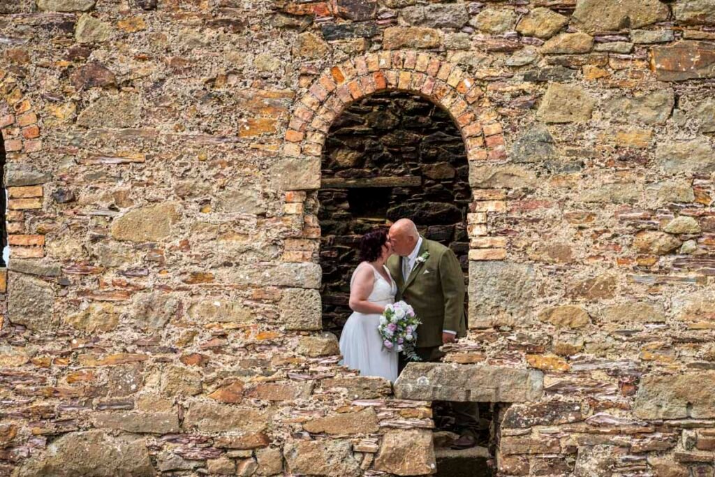 Bride and Groom inside Wheal Coates mine engine house cornwall