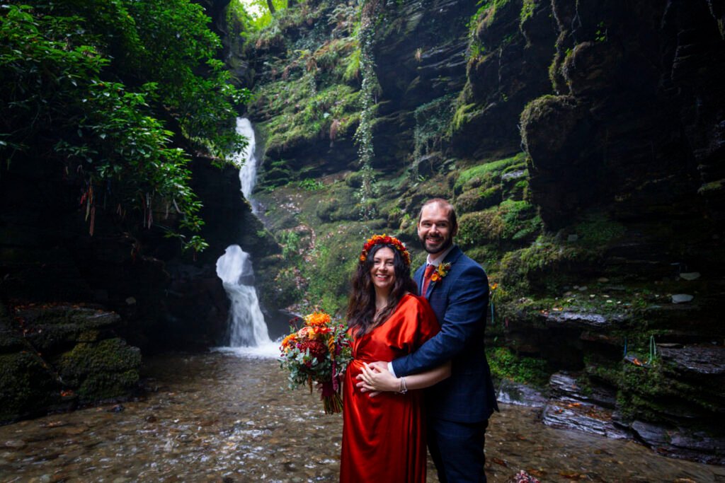 Bride and Groom by a waterfall