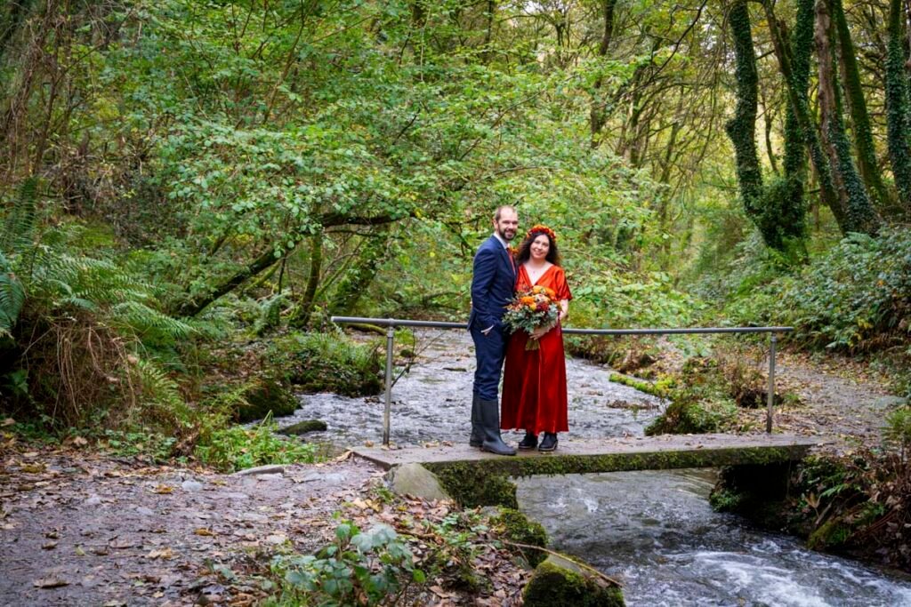 Bride and Groom by a stream