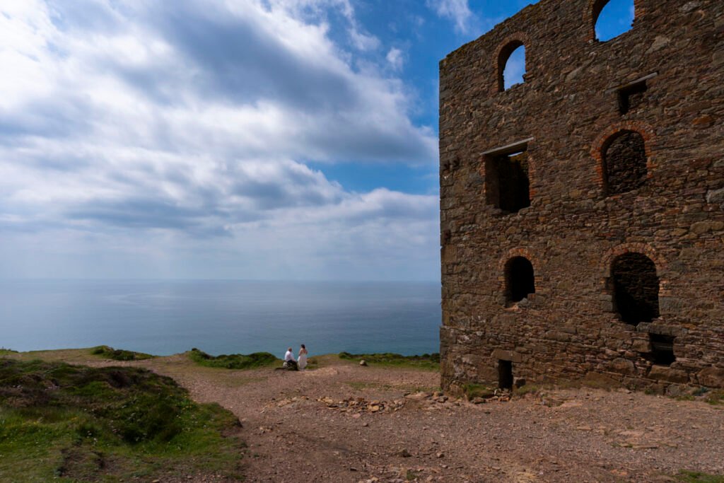 Bride and Groom on the coastpath by Wheal Coates mine engine house