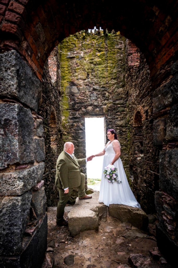 Bride and Groom inside Wheal Coates mine engine house cornwall