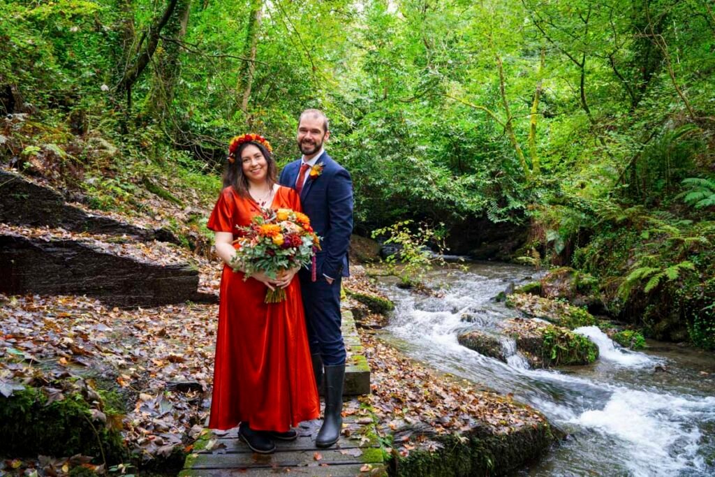 Bride and Groom by a stream