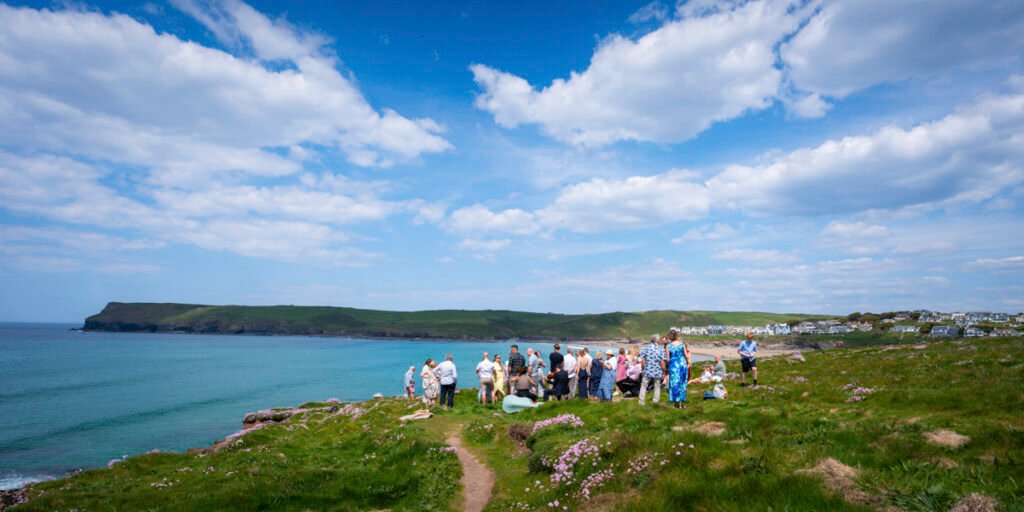 the wedding ceremony on the cliff top overlooking the beach