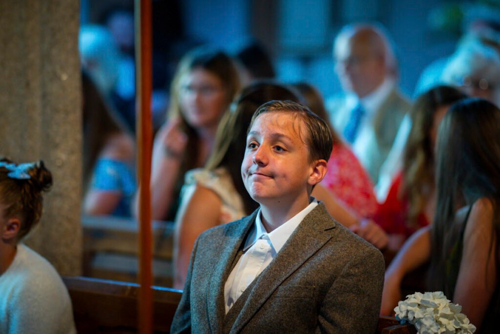 Page boy during the ceremony