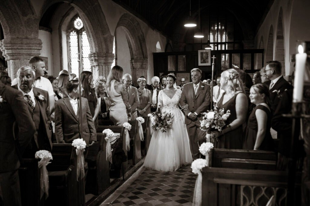 Bride coming down the aisle B&W