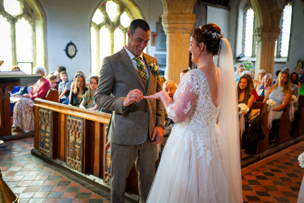 Bride and Groom wedding rings during the ceremony