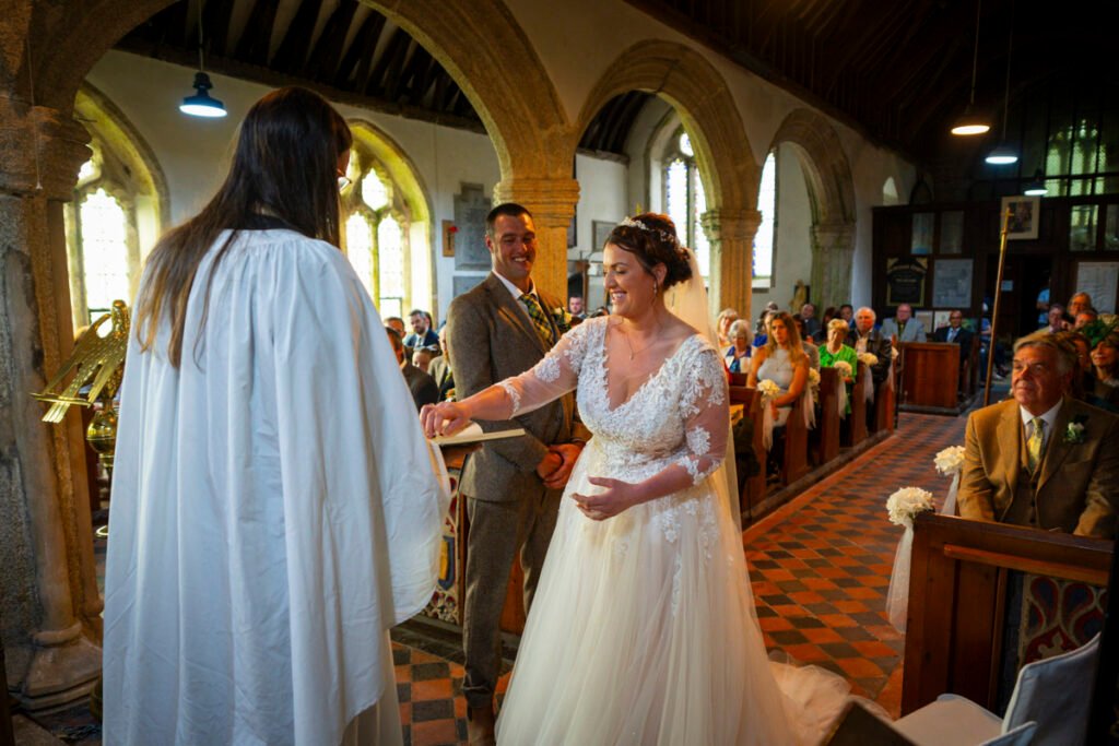 Bride and Groom wedding rings during the ceremony