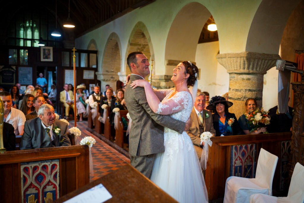 Bride and Groom embrace during the ceremony