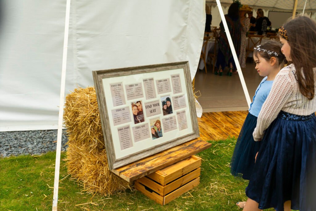 two girls looking at the table settings
