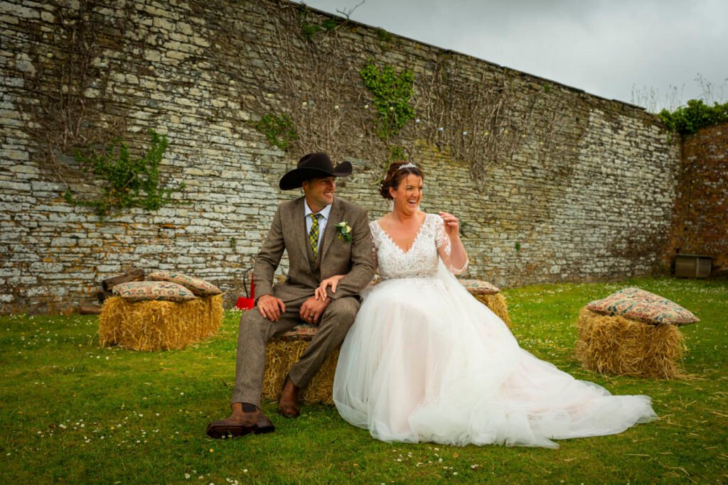Bride and Groom on a hay bale
