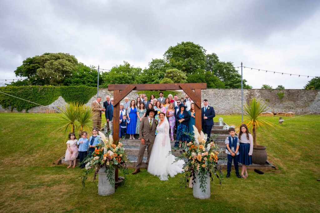 Group shot Bride and Groom with friends
