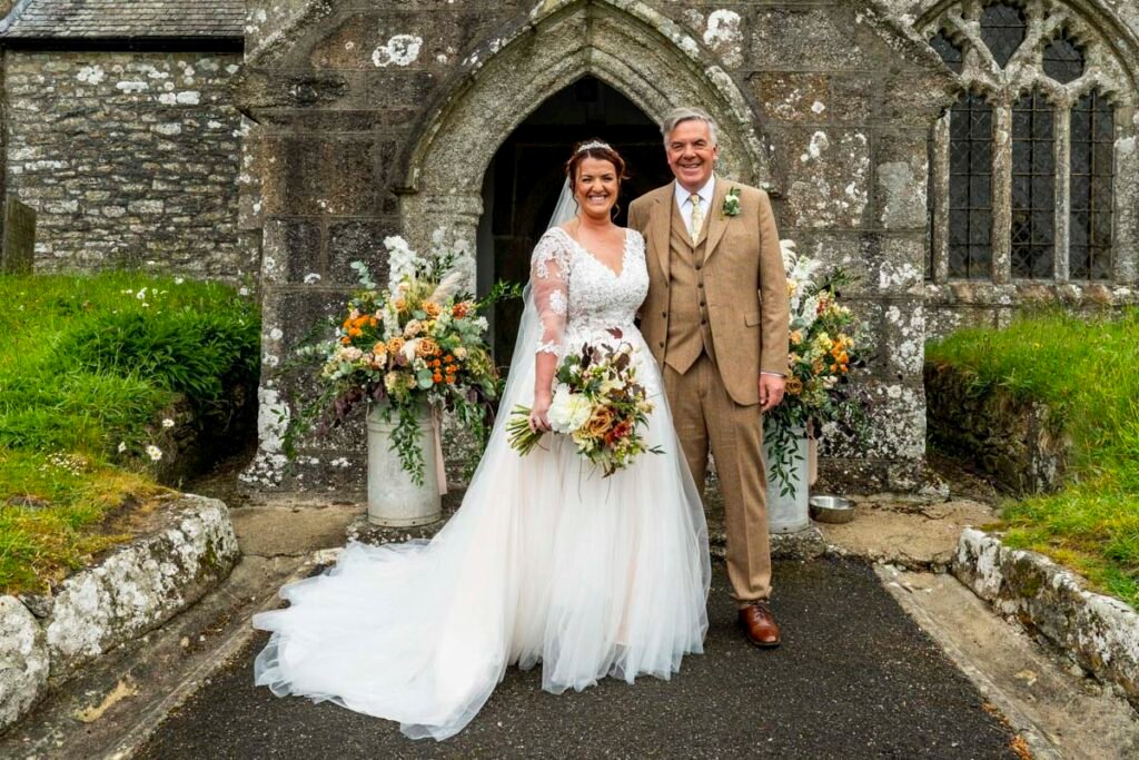Bride and Father of the bride outside the church