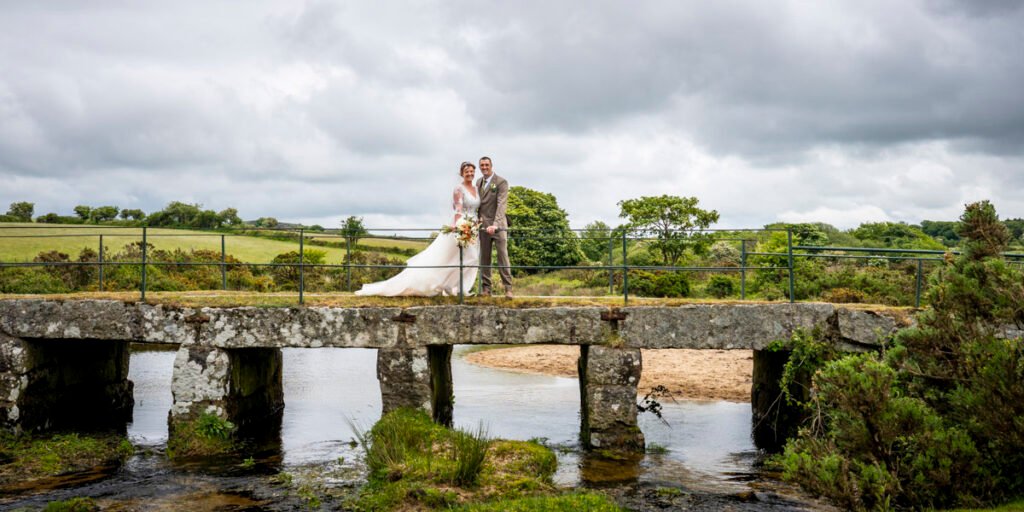 Bride and Groom on a bridge